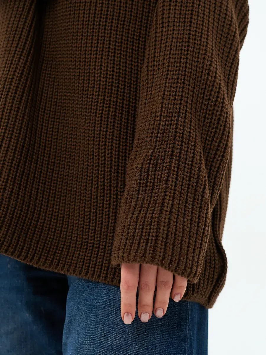 Detail of the Atlas Sweater by Lauven, showcasing the cozy oversized knit in rich brown.