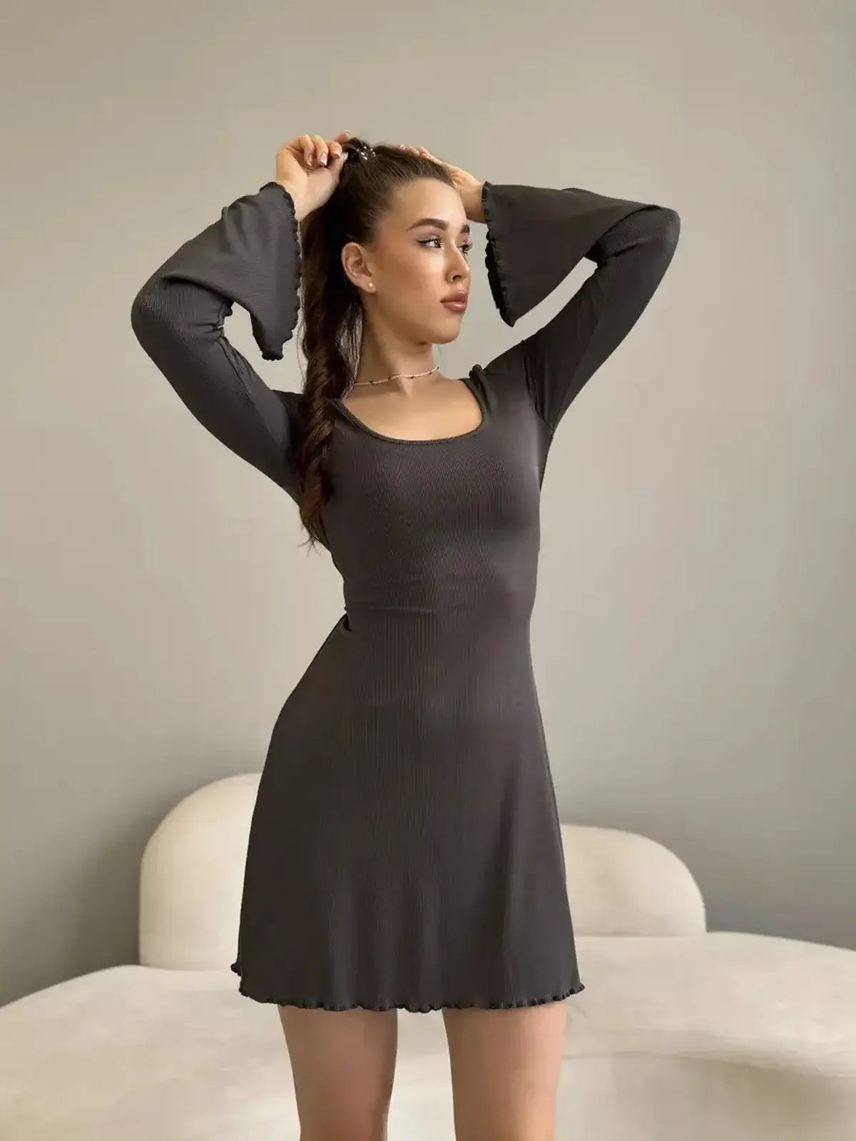 Ava Mini Dress by Lauven, ribbed knit, long sleeve with square neckline, bell sleeves, stylish and comfortable.