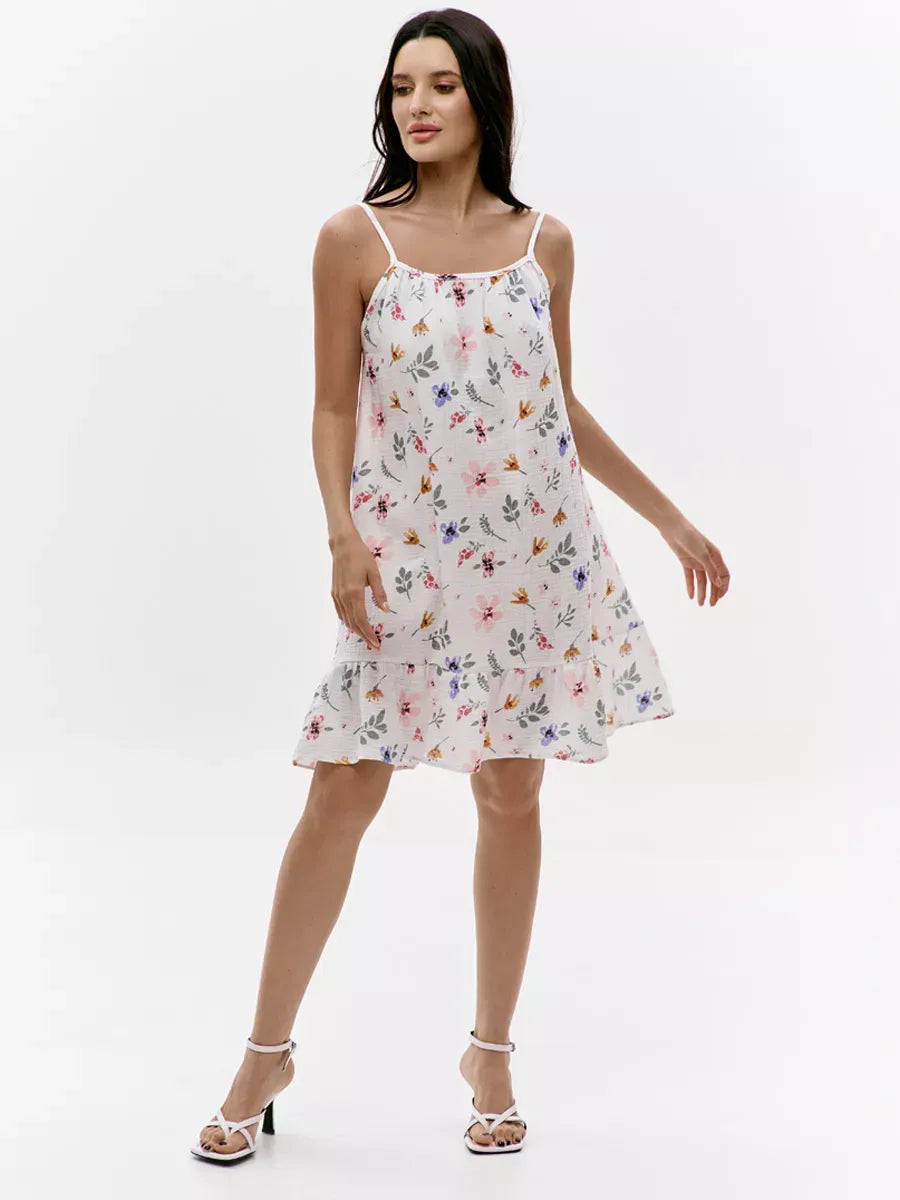 Blossom Mini Dress by Lauven, featuring a floral print and open back design, perfect for summer outings.