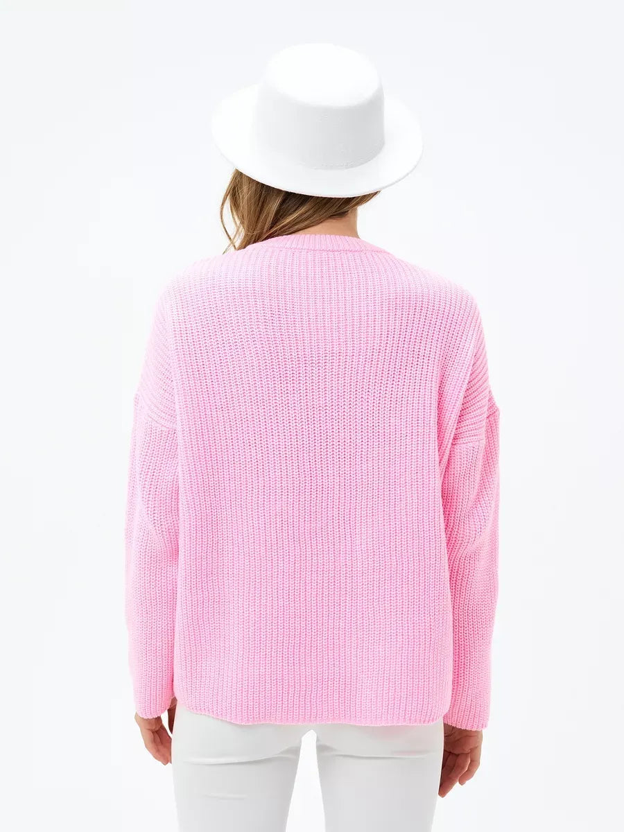 Back view of the Blossom Sweater by Lauven, an elegant oversized knit in soft pink, showcasing cozy style.