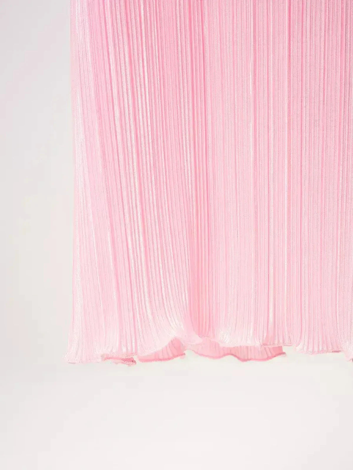 Candy Maxi Dress featuring soft pleated pink fabric for a flowy and feminine look.