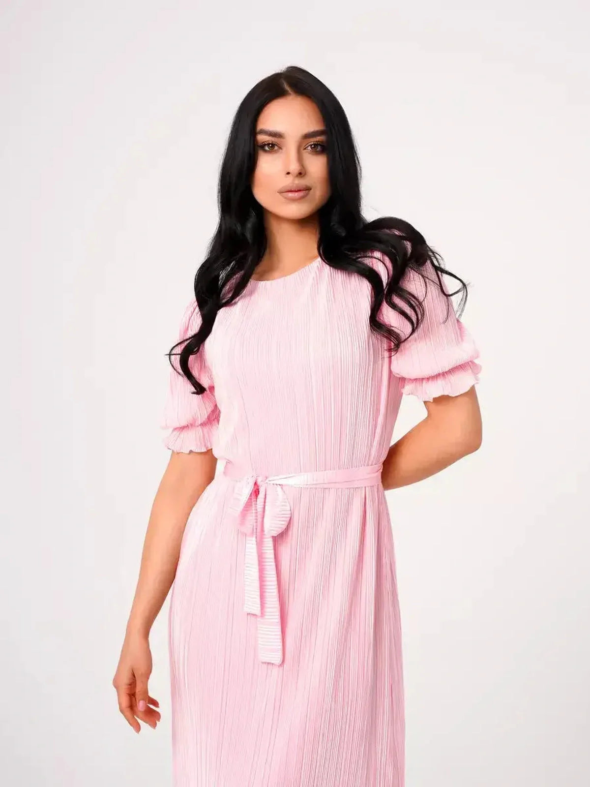 Candy Maxi Dress in pink with pleated fabric, puff sleeves, and a tie waist for a stylish and feminine look.