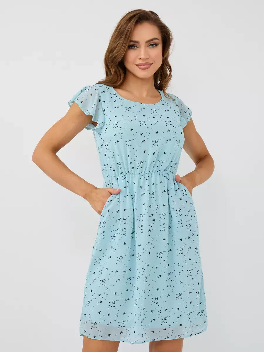 Celeste Mini Dress by Lauven - Elegant light blue ruffle dress perfect for special occasions and warm autumn days.