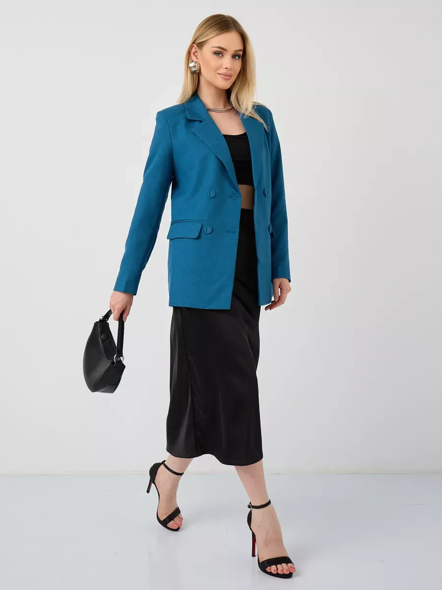 Diana Blazer by Lauven worn with a black skirt; a chic, cropped design perfect for versatile styling.