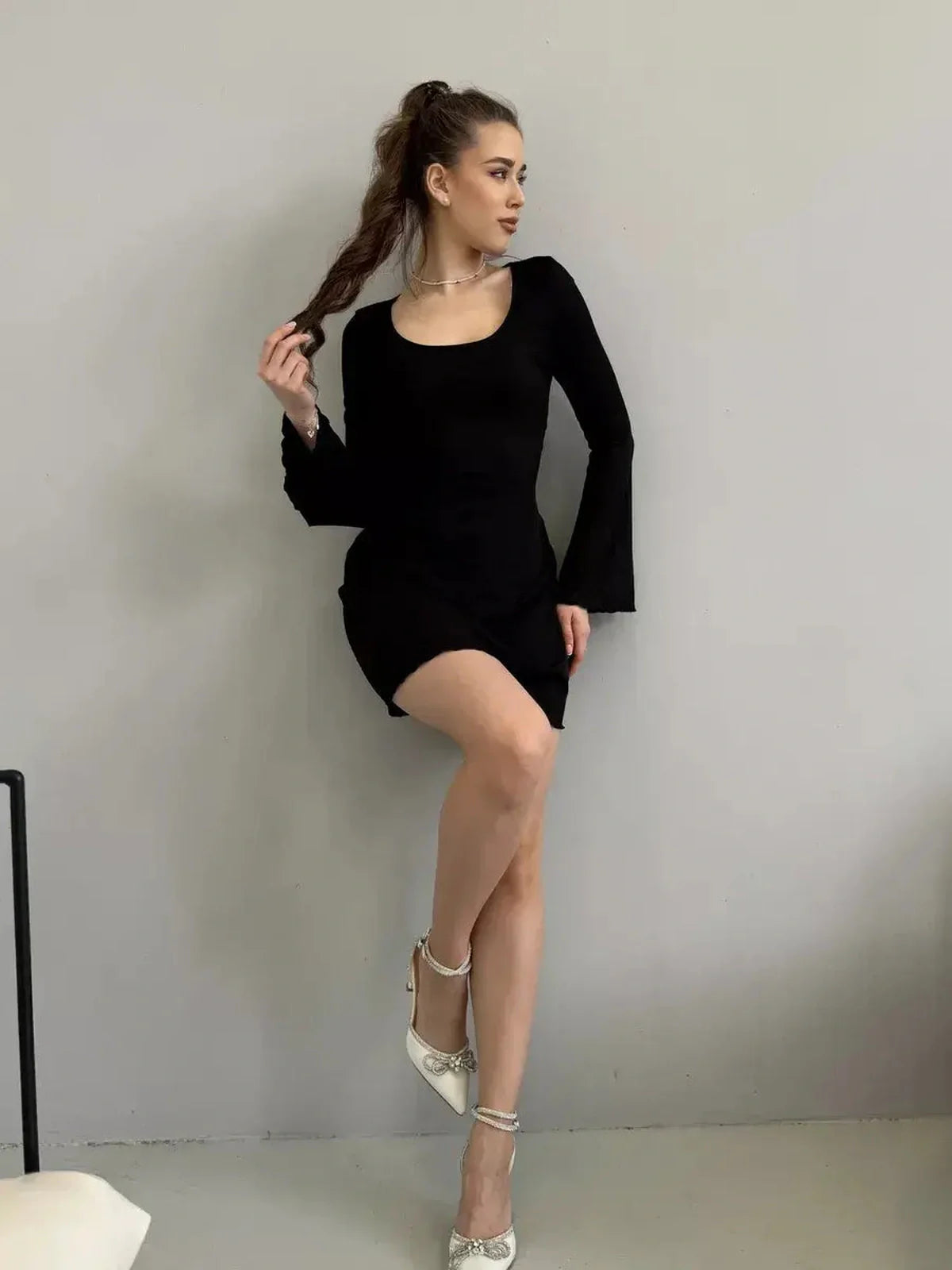 Emily Mini Dress by Lauven - Black ribbed knit long sleeve dress with square neckline and flared cuffs.