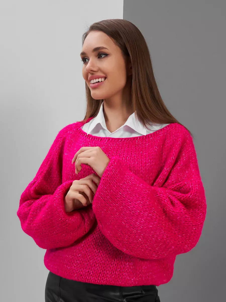 Isolde Sweater by Lauven, oversized fuchsia knit with boat neck and chunky texture, showcasing bold modern style.