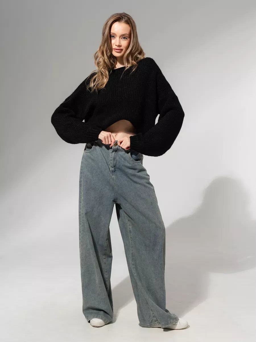 Noir Sweater by Lauven - Oversized off-shoulder knit in classic black, styled with wide-leg jeans.