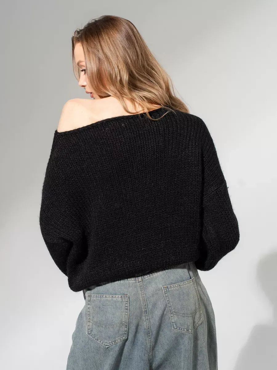 Noir Sweater by Lauven — Oversized off-shoulder knit in classic black, showcasing cozy sophistication and modern minimalism.