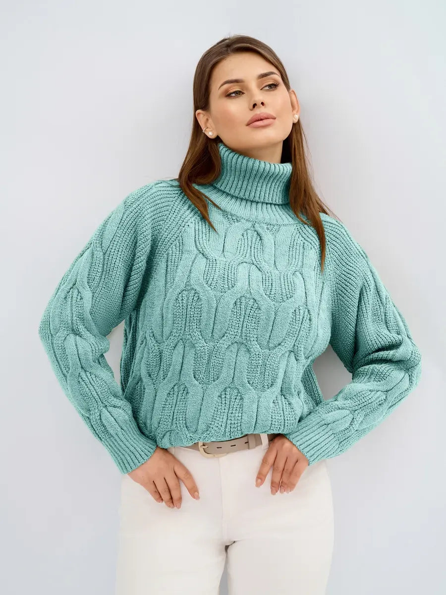Laguna Sweater by Lauven in a cozy oversized cable knit with high neck and textured design.