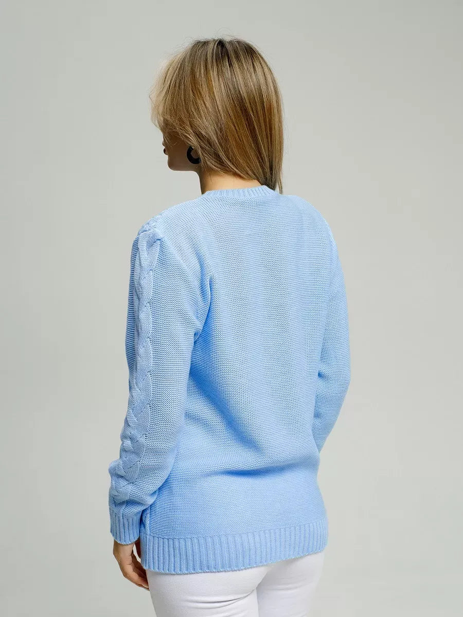 Back view of woman wearing the Alba Pullover by Lauven in light blue, showcasing its classic fit and breathable comfort.