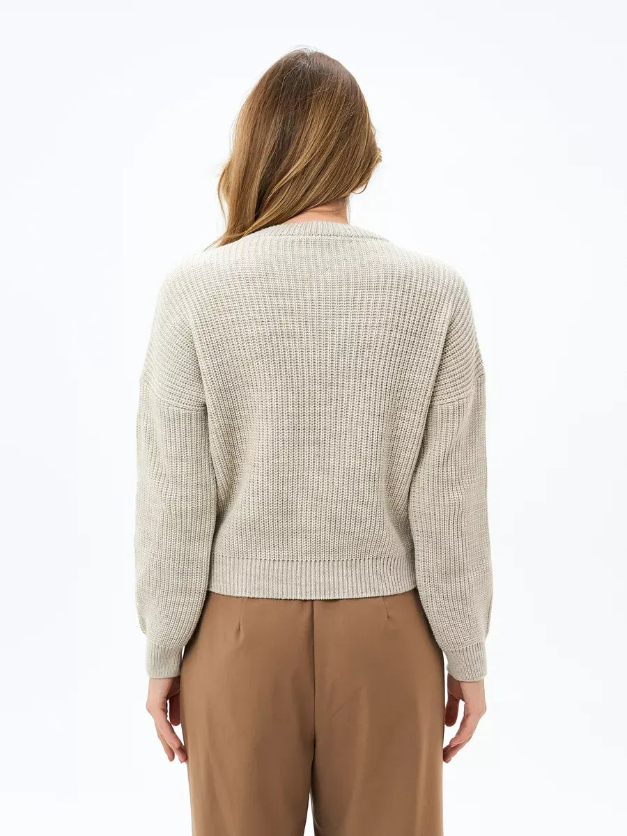 Astra Sweater by Lauven, light beige oversized knit with a ribbed texture in a relaxed fit from the back.