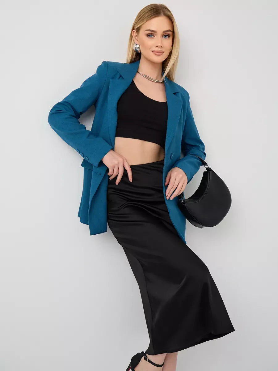 Diana Blazer by Lauven worn with a black crop top and skirt, showcasing classic cropped elegance and versatility.