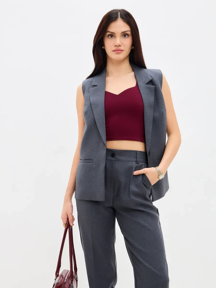 Graphite Suit Set by Lauven featuring a sleeveless vest and high-waist pants, perfect for modern women's fashion.