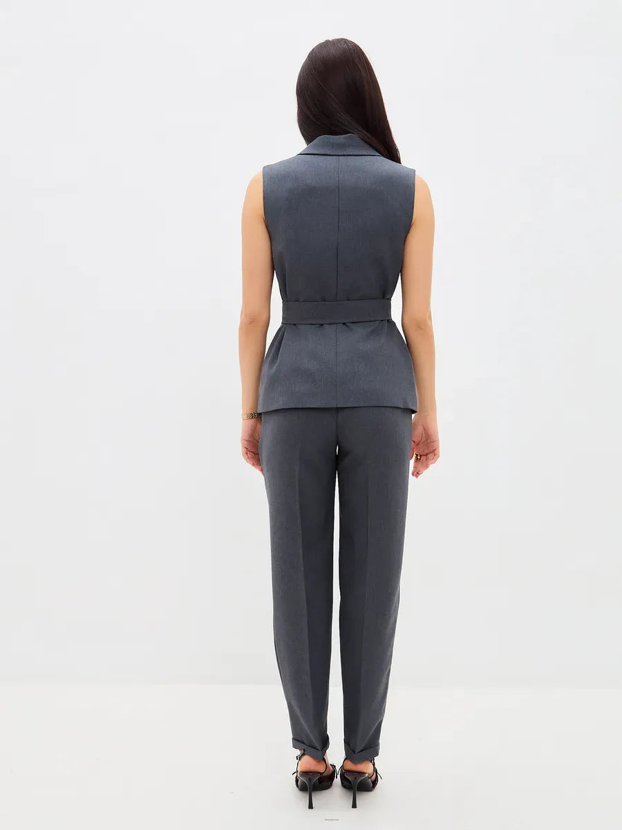 Graphite Suit Set by Lauven, showcasing a sleeveless vest and high-waist trousers from the back view.
