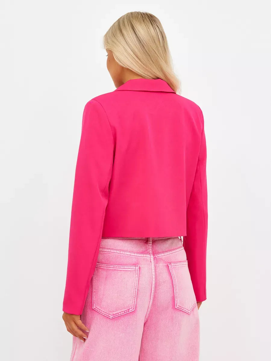 Back view of woman wearing Lauven Magenta Blazer, showcasing the vibrant pink cropped tailored design.
