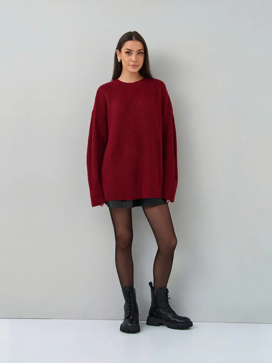 Maribel Sweater by Lauven in oversized burgundy knit worn with shorts and combat boots on a model.