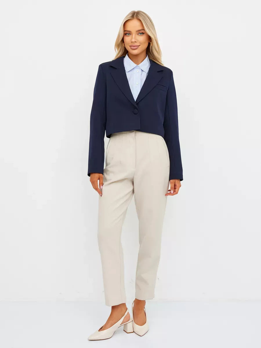 Lauven Navy Blazer in cropped tailored design paired with cream trousers, showcasing timeless style and elegance.
