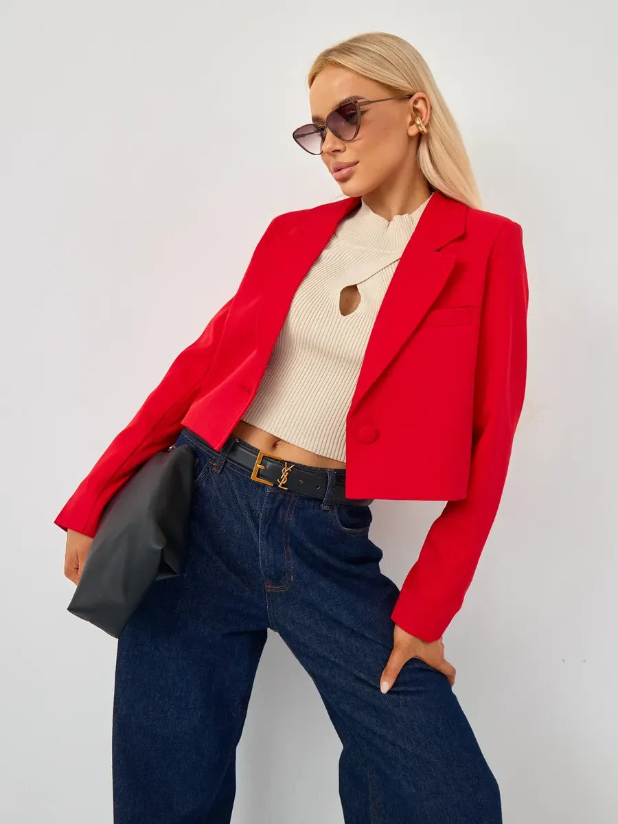 Ruby Blazer by Lauven, cropped red tailored blazer styled with a cream top and denim pants, exuding elegance.