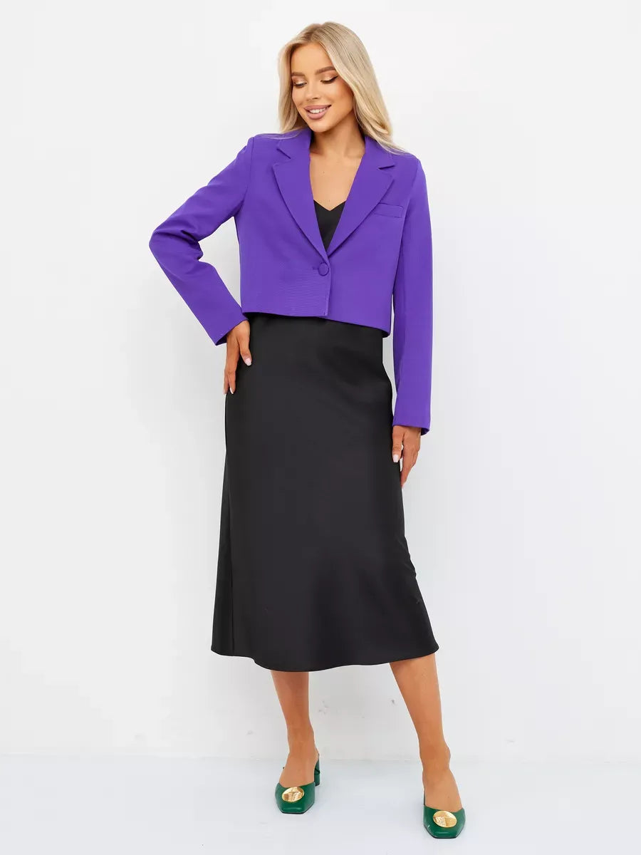 Violet Blazer by Lauven styled over a black dress, showcasing a chic and modern cropped silhouette in a deep purple hue.