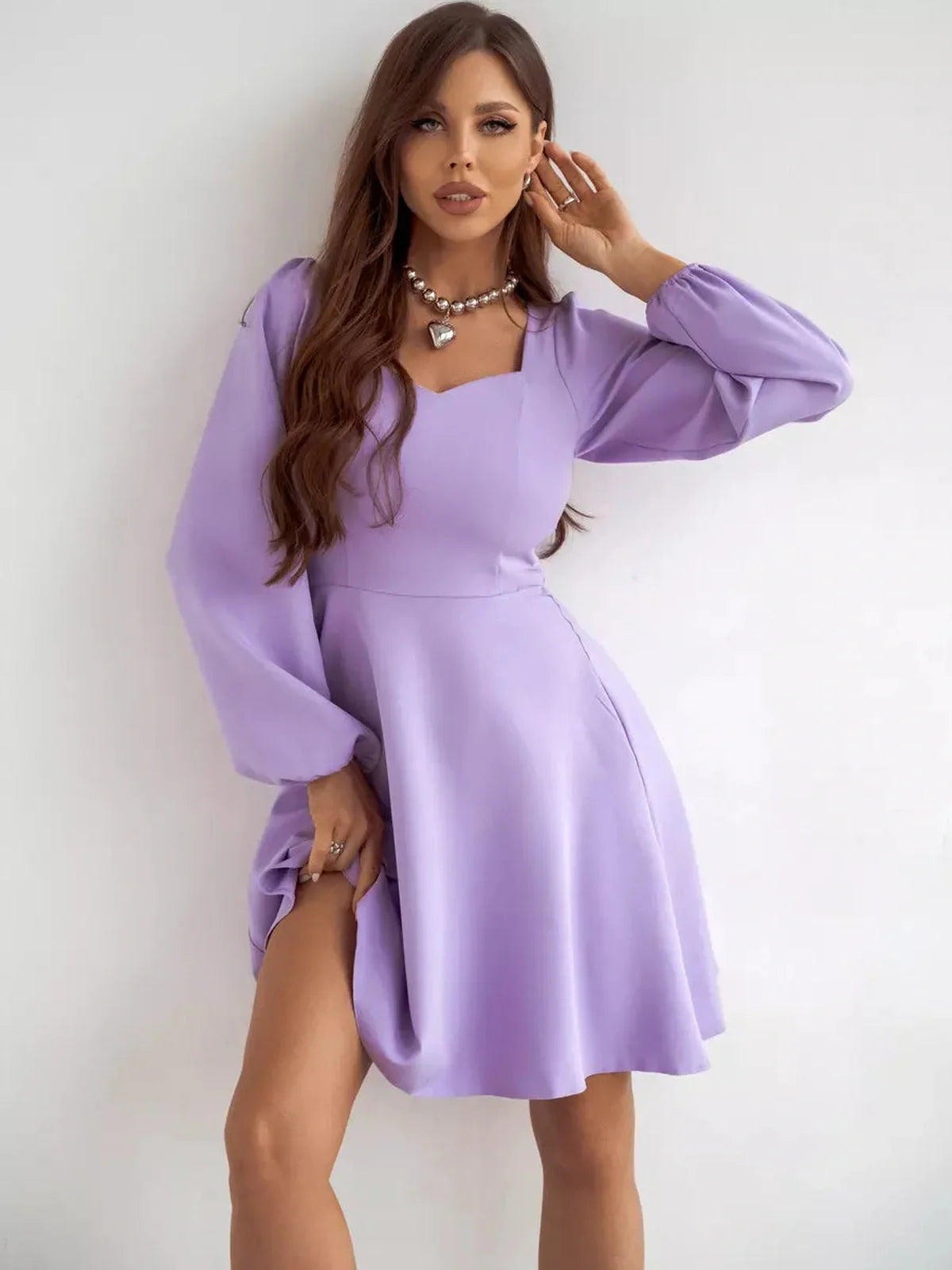 Lilac Mini Dress by Lauven, featuring long sleeves and a sweetheart neckline, perfect for cocktail events.