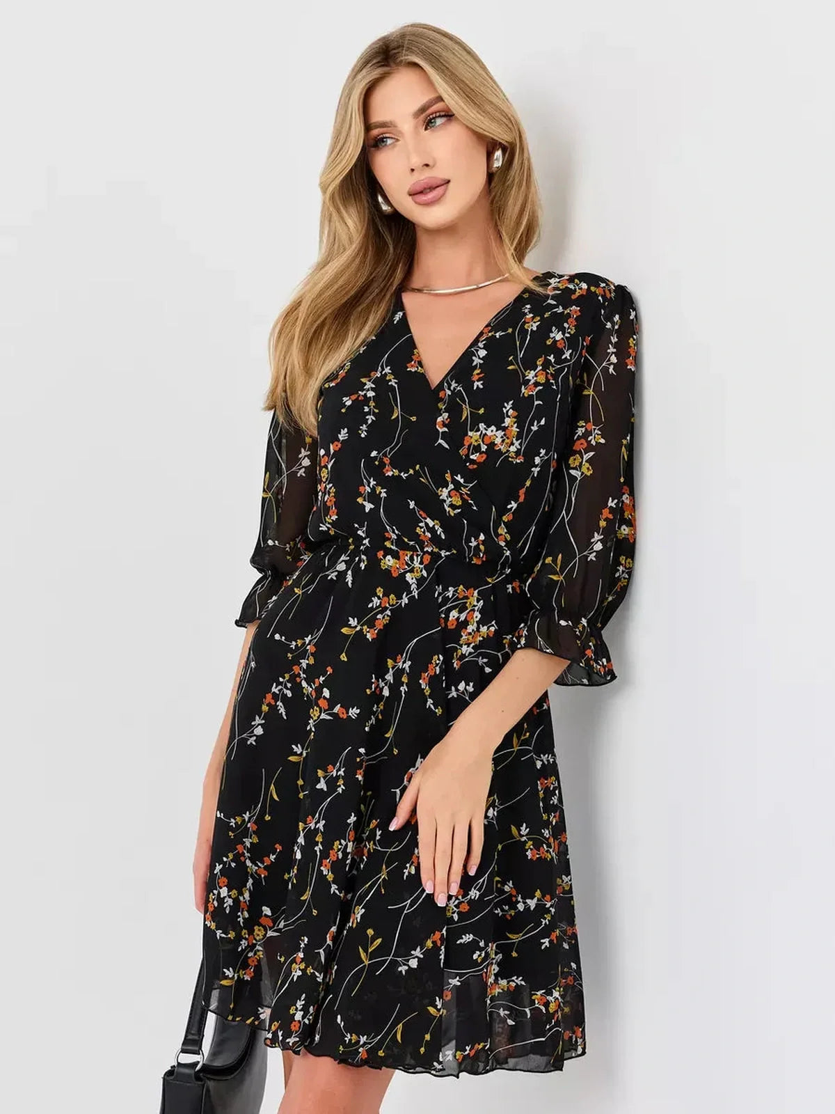 Lotus Mini Dress by Lauven - Black floral wrap dress with deep V-neckline and 3/4 puff sleeves.