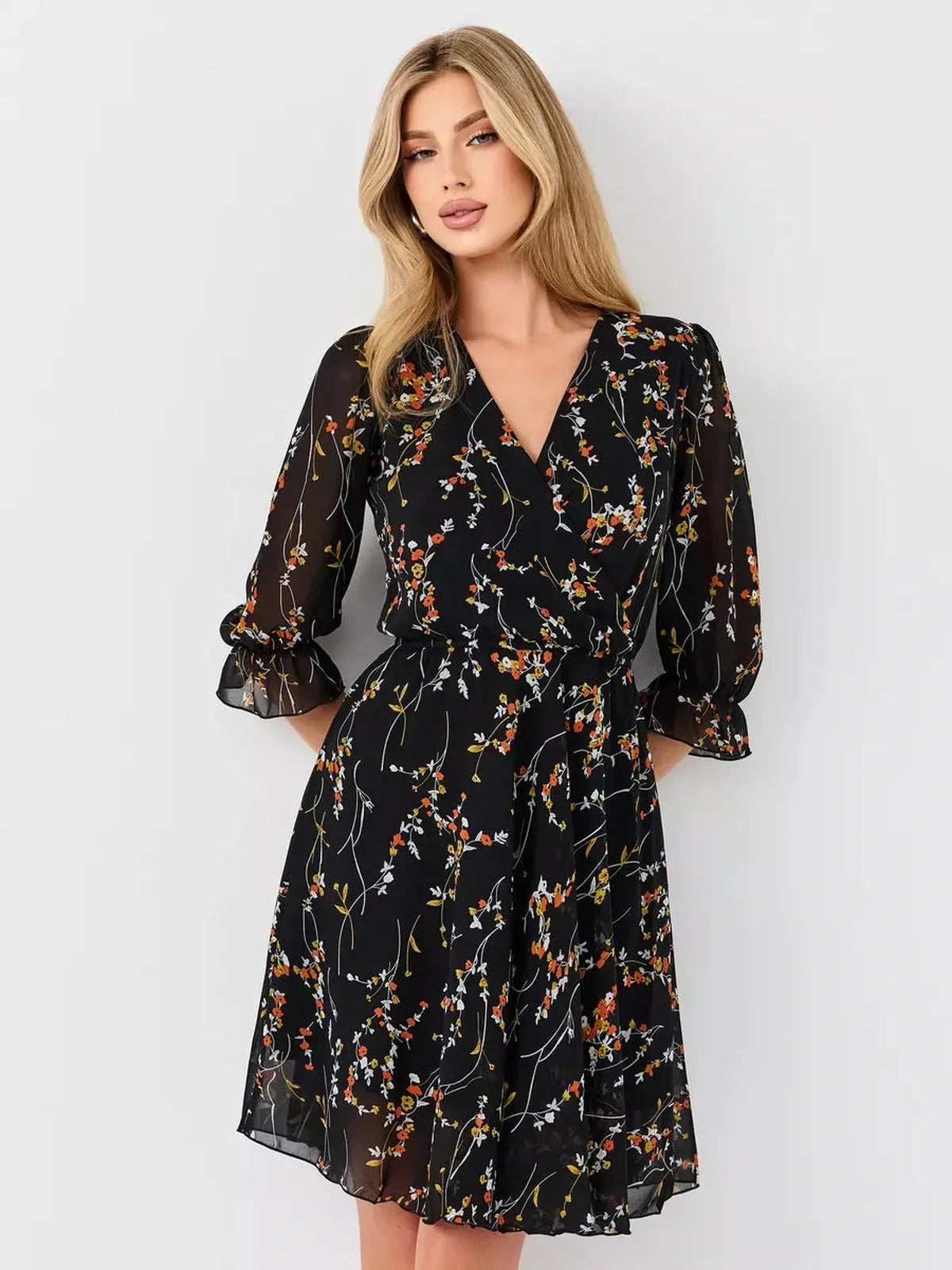 Lotus Mini Dress by Lauven - Black floral wrap dress with a deep V-neckline and 3/4 puff sleeves.