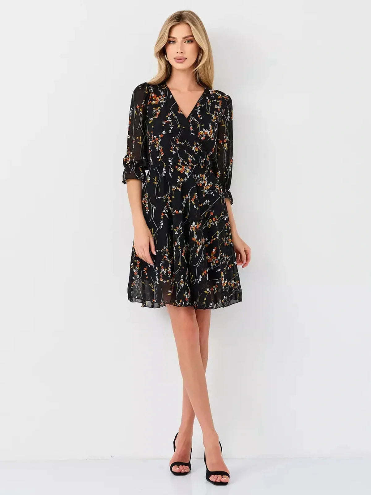 Lotus Mini Dress by Lauven - Black floral wrap dress with 3/4 puff sleeves and V-neckline.