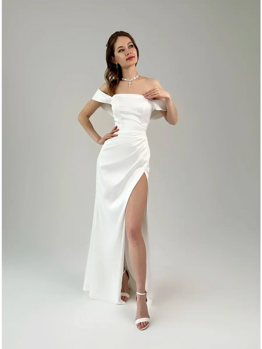 Lyra Occasion Dress by Lauven - Elegant white satin off-shoulder gown with draping and thigh-high slit.