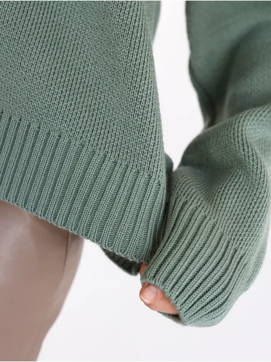 Lyra Pullover by Lauven showcasing the soft pistachio green knit design and oversized fit for women.