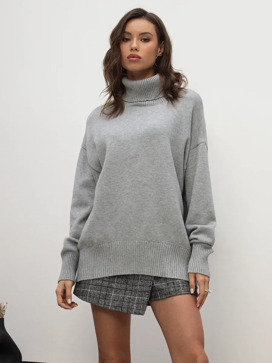 Lyra Sweater by Lauven in light grey turtleneck, showcasing relaxed silhouette and cozy elegance.