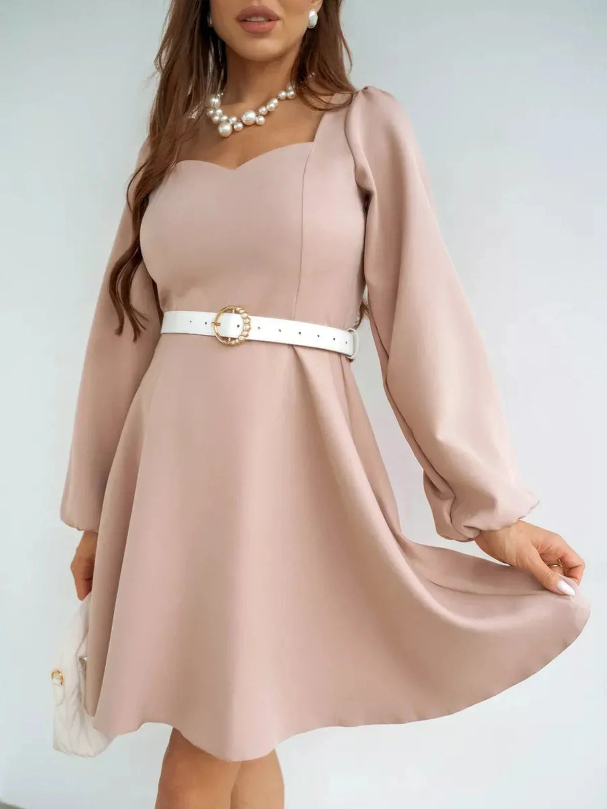 Lauven Milanese Mini Dress in blush pink, featuring long sleeves, A-line skirt, and square neckline.