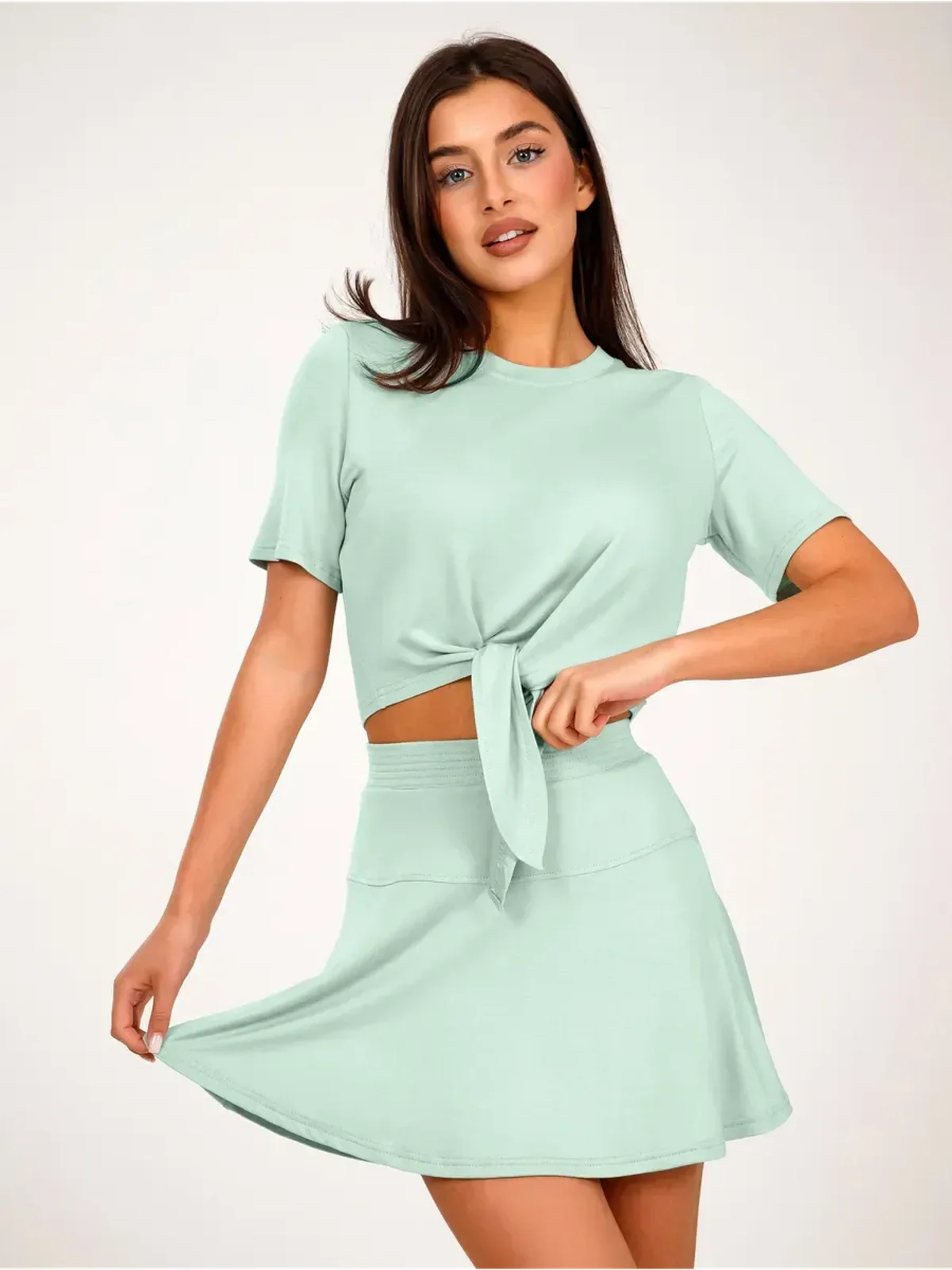 Mint Set by Lauven - Mint green two-piece outfit featuring cropped tie-front top and flared mini skirt.