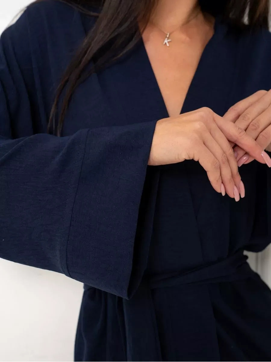 Navy Suit Set by Lauven, showcasing a classic oversized two-piece deep blue outfit with wide sleeves and stylish belt.