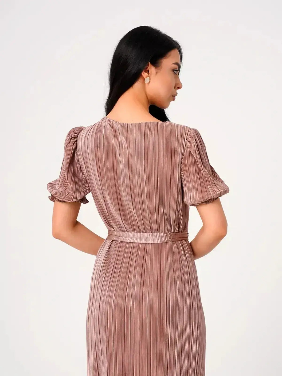 Back view of the elegant Noa Maxi Dress by Lauven featuring pleated texture and puff sleeves.