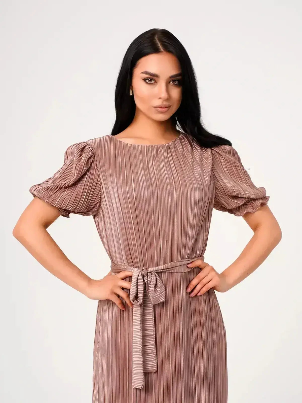 Noa Maxi Dress featuring elegant pleats, puff sleeves, and a flattering silhouette in light cappuccino hue.