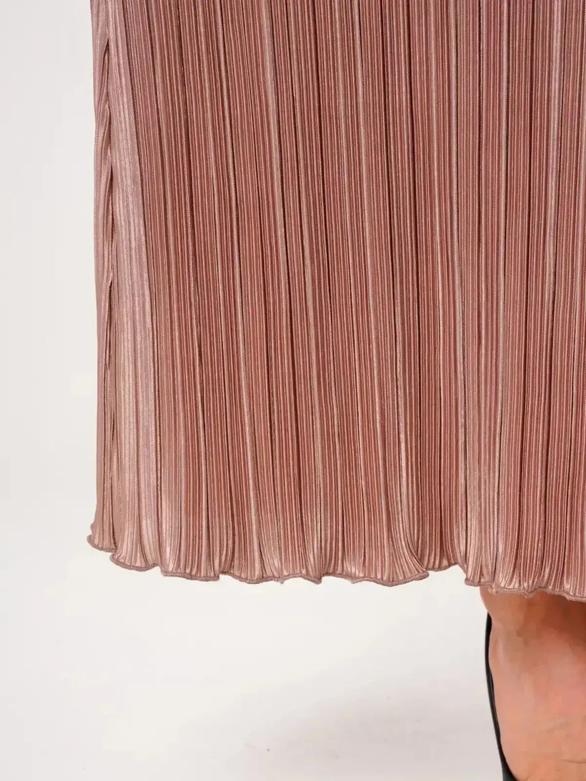 Pleated detail of the Lauven Noa Maxi Dress in light cappuccino, showcasing its elegant drape and texture.