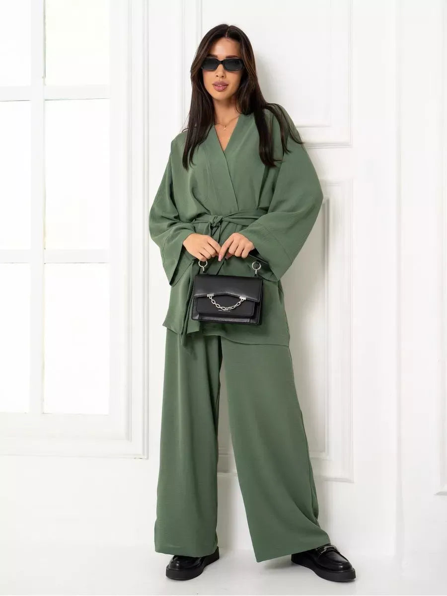 Olive Suit Set by Lauven, featuring an elegant oversized two-piece in soft green fabric with wide-leg trousers.