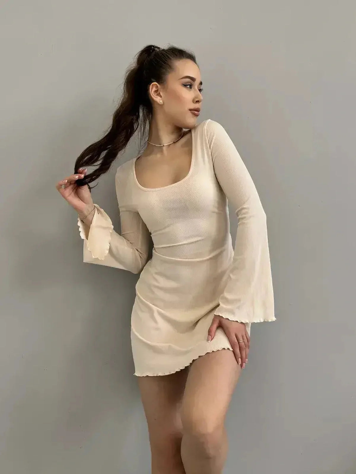 Olivia Mini Dress by Lauven featuring beige ribbed knit, long sleeves, square neckline, and back tie.