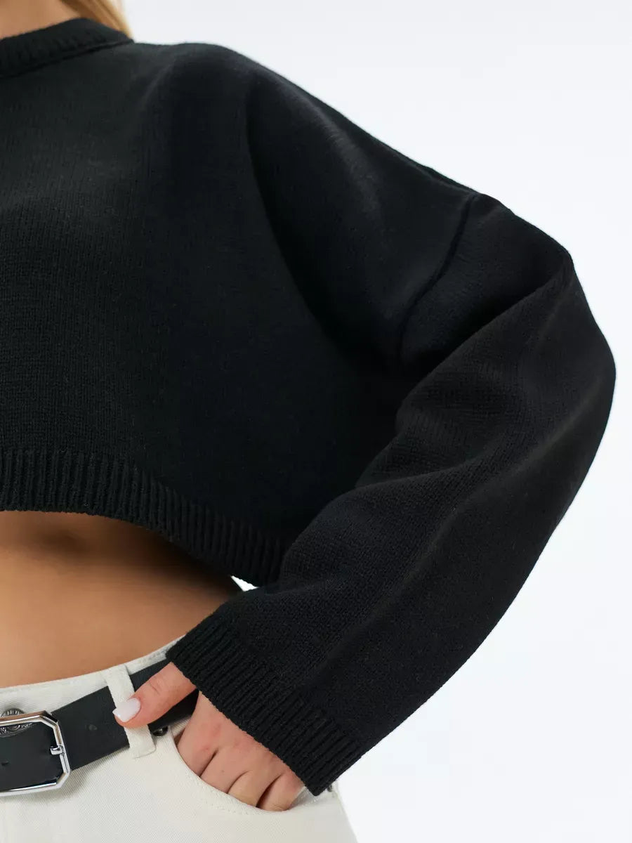 Onyx Sweater by Lauven - Cropped oversized black knit sweater showing details of the fabric and style.