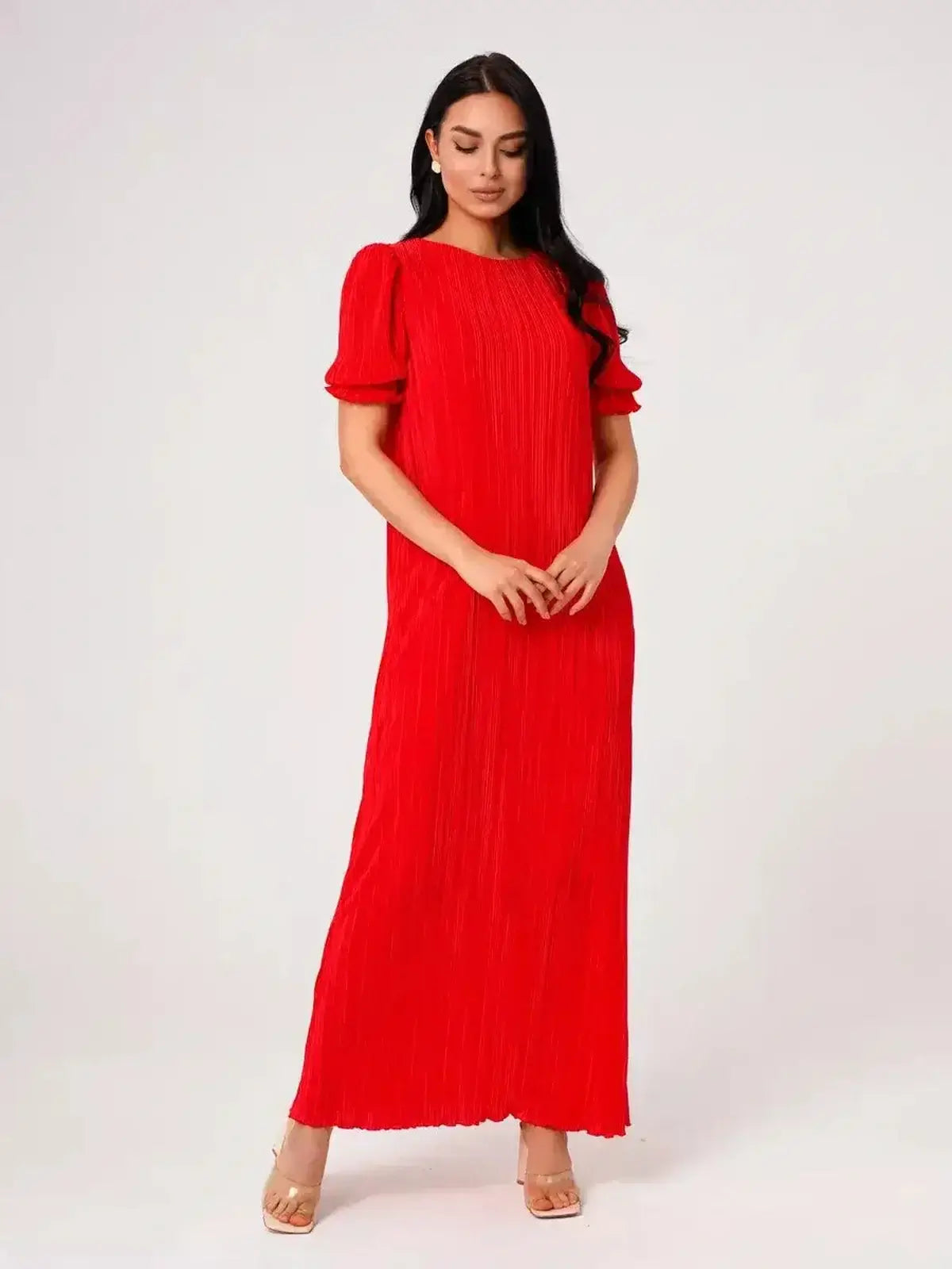 Ophelia Maxi Dress by Lauven in pleated red fabric, featuring romantic puff sleeves and a flowing silhouette.