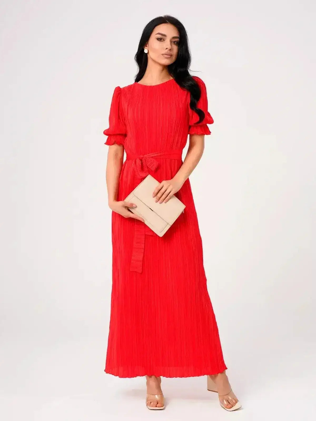 Ophelia Maxi Dress in vibrant red with pleated fabric and romantic puff sleeves, featuring a belted waist.