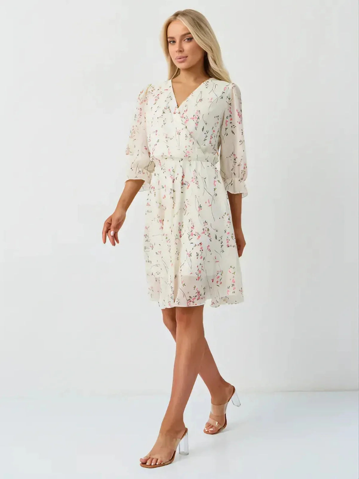 Petunia Mini Dress by Lauven, white floral wrap dress with V-neckline and three-quarter sleeves.