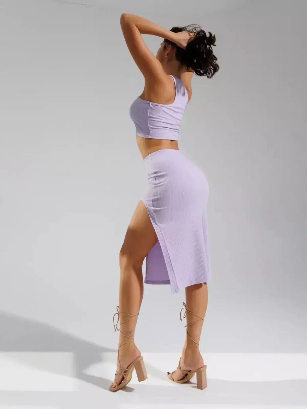 Piper Cutout Set by Lauven – Lilac ribbed knit two-piece featuring crop top and high-waisted skirt with thigh-high slit.