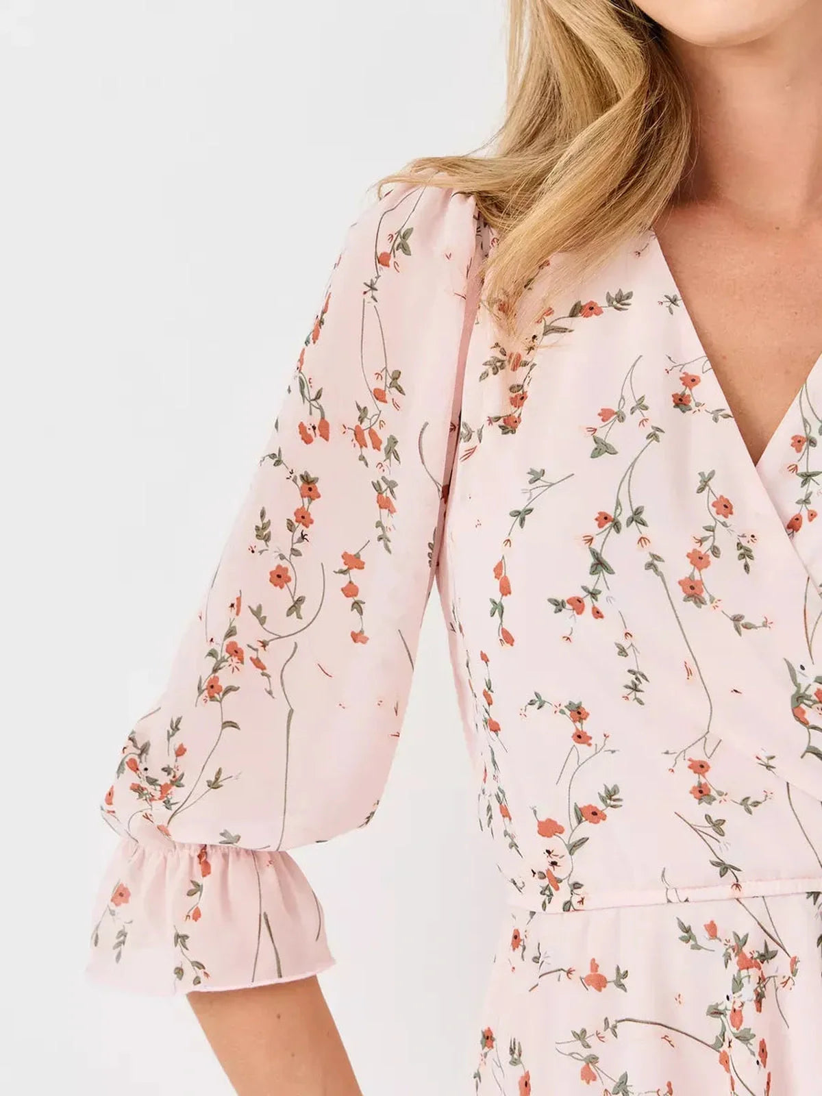 Primrose Mini Dress by Lauven - Close-up of pink floral design and 3/4 puff sleeves.