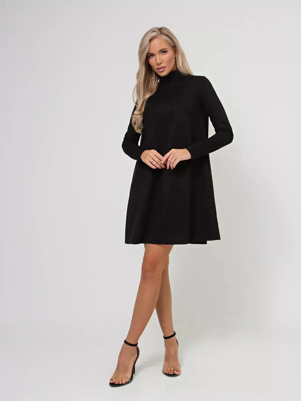 Quinn Mini Dress by Lauven – Black long sleeve A-Line with mock neck and back zip, perfect for any occasion.