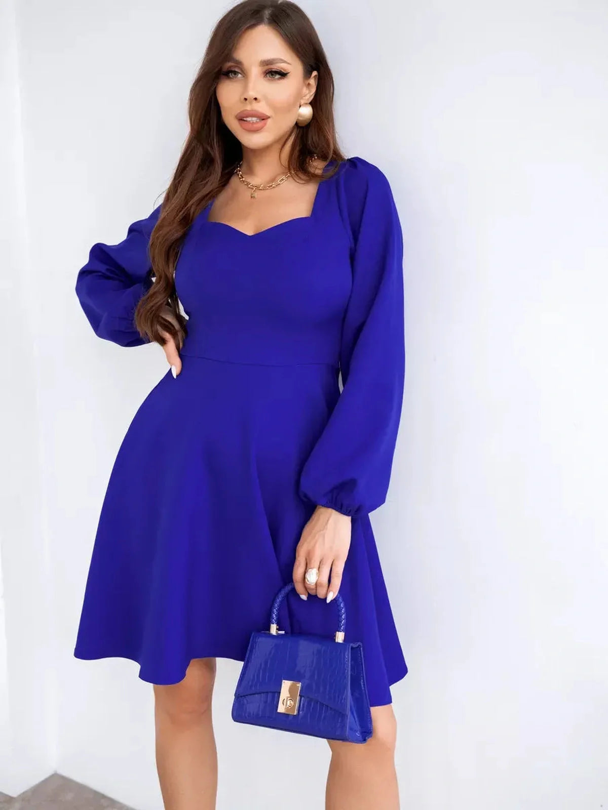 Royal Mini Dress by Lauven, flared mini dress with long sleeves and square neckline in vibrant royal blue.