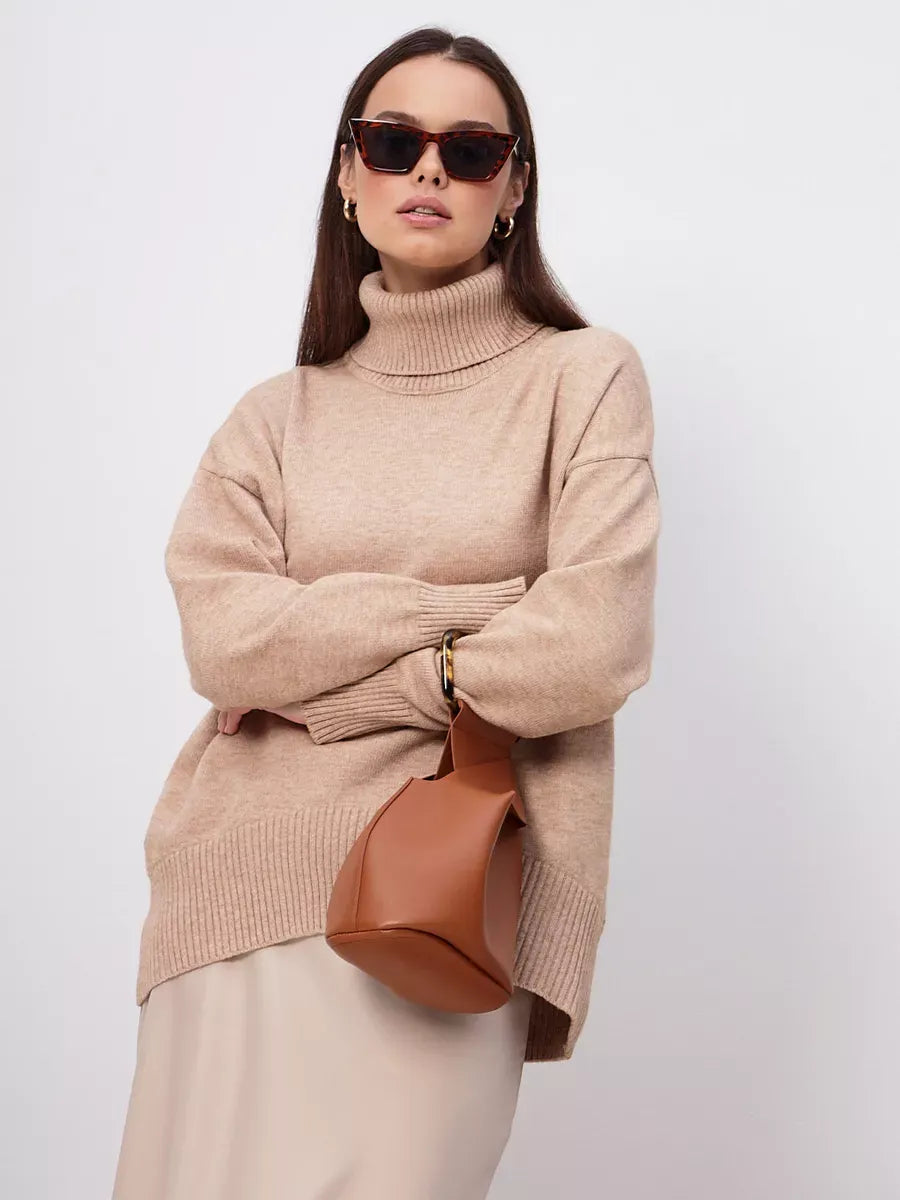 Selene Sweater by Lauven in dark beige worn with sunglasses and a stylish handbag.