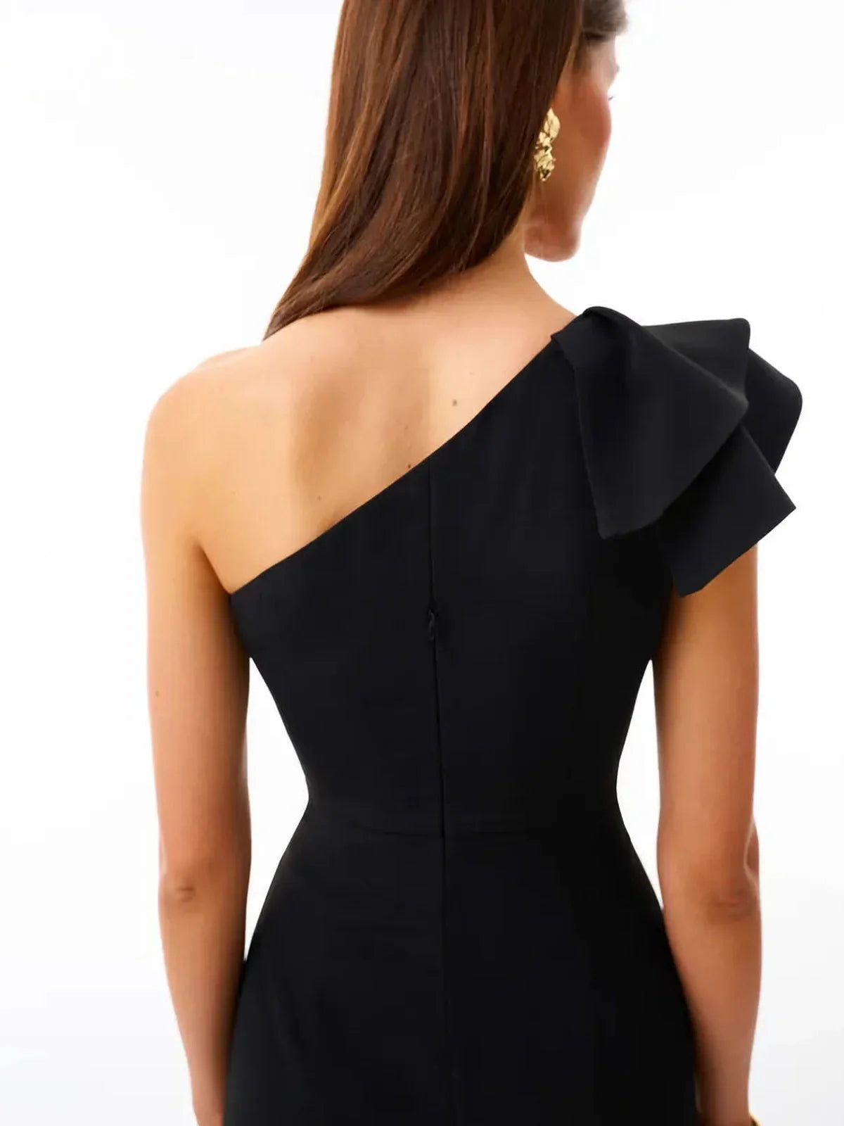 Vivienne Midi Dress by Lauven, detail of the one-shoulder design showcasing ruffled accent in elegant black.