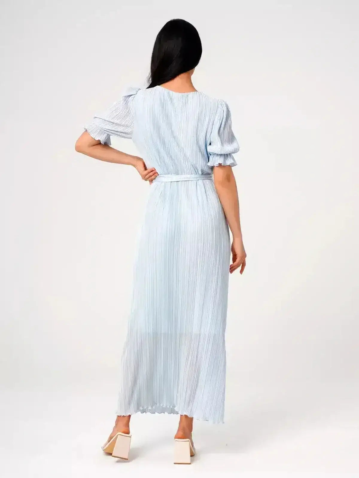 Angel Maxi Dress – Light blue pleated elegance with waist tie, showcasing a graceful back view.