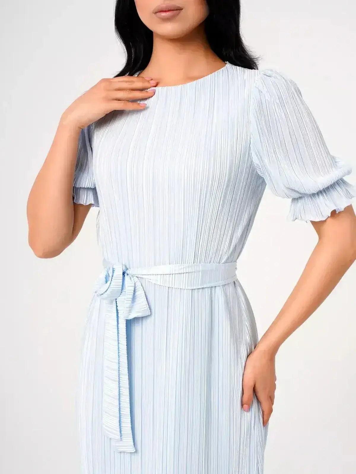 Angel Maxi Dress – Light blue pleated design with puff sleeves and self-tie waistbelt for elegant styling.